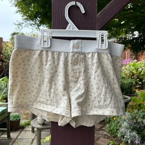 Brandy Melville cream mini shorts